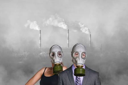 57101208-business-people-wearing-gas-mask-on-the-pollution-air-and-factory-background.jpg